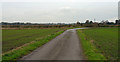 Bend of farm road beside Earnshaw