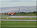 SJ8184 : Jet and Fire Tender, Manchester Airport by David Dixon