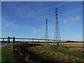 TQ9169 : Pylons carrying power over the Swale by Chris Whippet