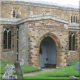 SP8263 : Mixed building stones, porch of St Mary Magdalene, Ecton by Robin Stott