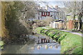 Houses reflected in the Monmouthshire and Brecon Canal