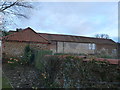 TF6738 : Old barn near Heacham Manor Hotel, Norfolk by Richard Humphrey