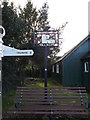 TG2504 : Arminghall Village sign & seat by Geographer
