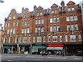 Parade of shops and apartments, Brompton Road SW3