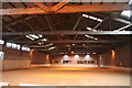 Old wood-truss roofed building at Bunny Hill Riding Centre