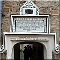 1638 inscription over the entrance to Hugh Perry Almshouses, Wotton-under-Edge