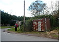 Rusty corrugated shed and a noticeboard in Dunwear