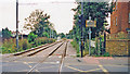 Croydon Tramlink: Kingston Road level-crossing and Merton Park tram-stop, 2000