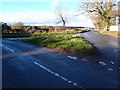 Grass covered road junction near Ugley