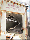TQ6475 : Derelict waiting area by Stephen Craven