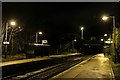 Upton railway station at night