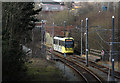 SD9304 : Tram approaching Oldham Mumps, seen from the footbridge by Alan Murray-Rust