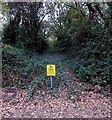 Yellow warning notice on a disused railway track in Hamble-le-Rice