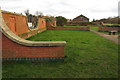 Gardens by the Measham Museum with Goods Sheds beyond