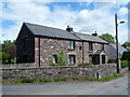 Stone wall and stone house in Llangynidr