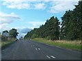 N8382 : The R162 between Castletown Cross Roads and Cross Guns Bar and Lounge by Eric Jones