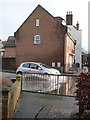 Poole: a car in floodwater on West Street