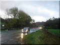 NY3117 : Traffic on a wet A591 at Thirlspot by Graham Robson