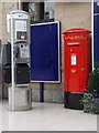 NJ9405 : Aberdeen: postbox № AB11 12 and phones, at the station by Chris Downer