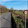 Bend ahead - 40mph speed limit on Cirencester Road north of Tetbury
