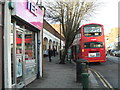 Bus 307 waits outside Sainsbury