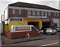 Garage and church, Southmead, Bristol