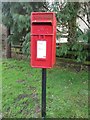 NU1230 : Post box in Bellshill by Graham Robson