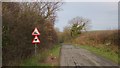 NZ6915 : Warning Signs on Long Lane by Matthew Hatton