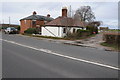 Cottages near the entrance to Sandford Villa Farm