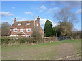 TR0853 : Pickelden Farm House from footpath by Marathon