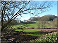 White House Farm across the fields from the road