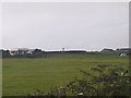 Rhosneigr - Ty Hen view of the fire station tower from the road in between the hill and park