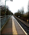 Yellow milepost at Fernhill railway station