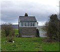 NU0321 : Old signal box at Roseden Crossing by Russel Wills