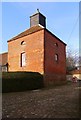 Dovecote at the entrance to the farmyard, Home Farm, Peper Harow