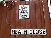 TL9940 : Heath Close, Polstead Heath sign on building by Hamish Griffin