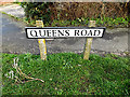 TM3388 : Queens Road sign by Geographer