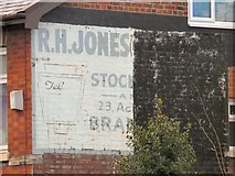 SJ8989 : Half a Ghost Sign by Gerald England