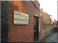 Old street name sign, Whitburn Road