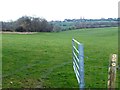 Junction of field footpath with byway near the buildings of Peak Farm