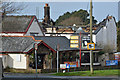 The Old Barn Inn and burnt out cottage at Bickington