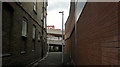 View down an alleyway off Ilford High Road