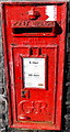 Closeup view of a George V postbox in Abercwmboi