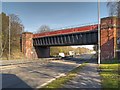 SJ5297 : Railway Bridge over the East Lancs Road by David Dixon