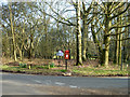 Postbox, notice board, seat