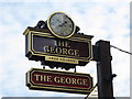 Sign (with clock) for The George, The Town, EN2