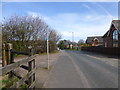 The site of a level crossing on the A6144 near Oughtrington