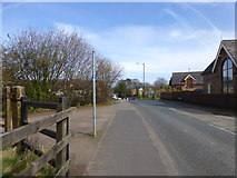 SJ6988 : The site of a level crossing on the A6144 near Oughtrington by Raymond Knapman