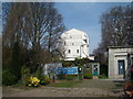 View of the side of a house from the entrance to Abney Park Cemetery