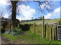 Waymarker for path to Brownhill Lane